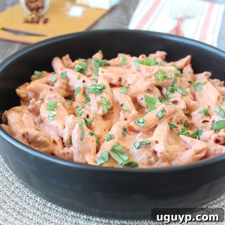 Hearty Italian Sausage Penne in a Four-Cheese Tomato Sauce 43 featured 17066