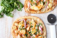 THAI PEANUT CHICKEN NAAN PIZZA WITH CRISPY VEGETABLES