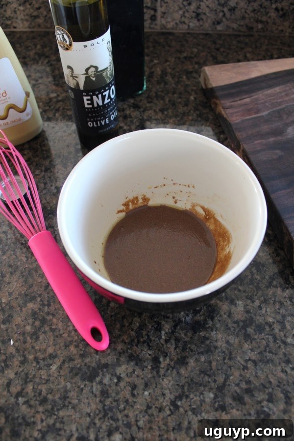 Balsamic Tri-Tip Recipe - A bowl showcasing the balsamic vinegar, dijon mustard, and olive oil mixture for the tri-tip marinade.