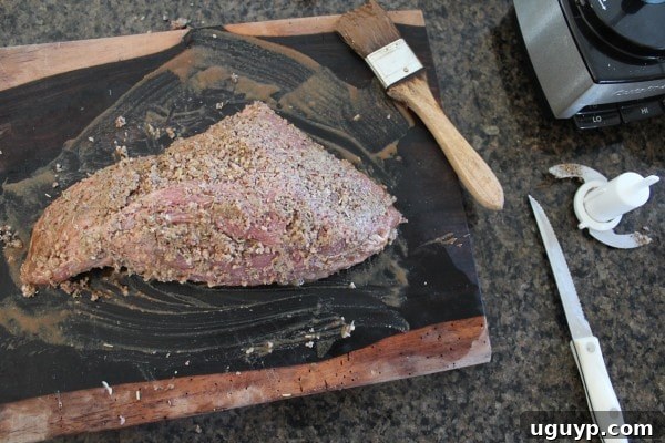 Walnut Crusted Tri Tip Recipe - A tri-tip steak generously coated with the walnut and garlic crust mixture.