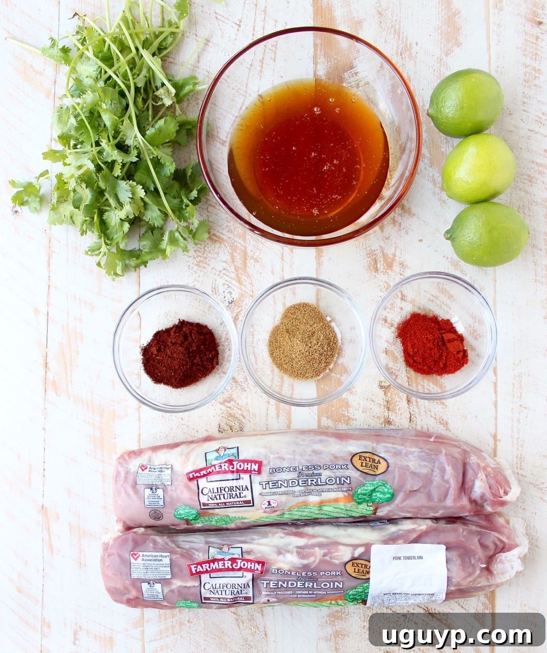 A trio of Slow Cooker Pulled Pork Tenderloin Chipotle Honey Tacos, each generously filled with meat and fresh toppings.