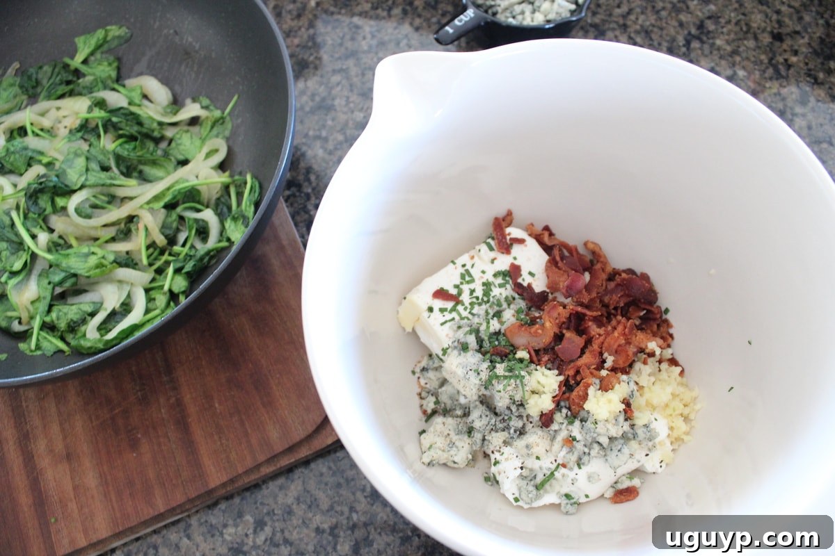 All creamy ingredients mixed together for Blue Cheese Spinach Dip