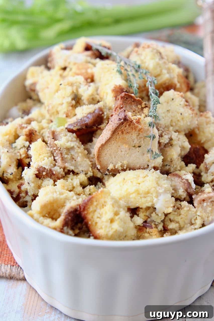 Gluten-free cornbread stuffing served in an elegant oval bowl, ready to be enjoyed.
