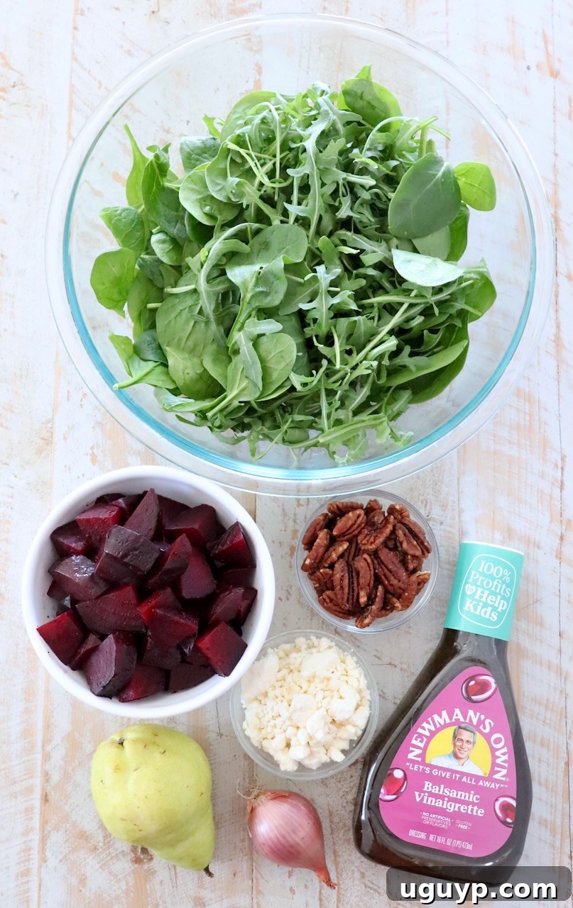 Close-up shot of a vibrant beet salad in a bowl, showcasing roasted beets, fresh greens, and various toppings.