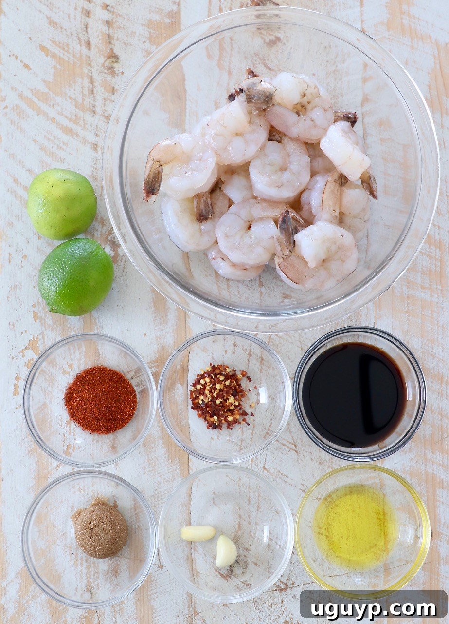 Ingredients for The Ultimate Grilled Shrimp Marinade laid out on a kitchen counter