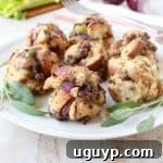 Sausage, potato bread, celery & sage are combined for a little taste of Thanksgiving all rolled up in these Sausage Stuffing Balls, perfect as a side dish or party appetizer!