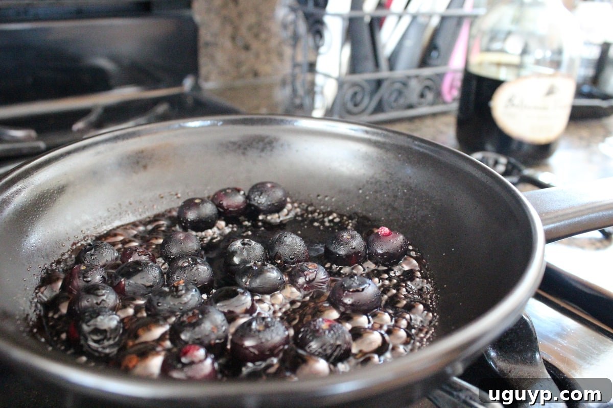 Vinegars added to the bursting blueberries to form the sauce.