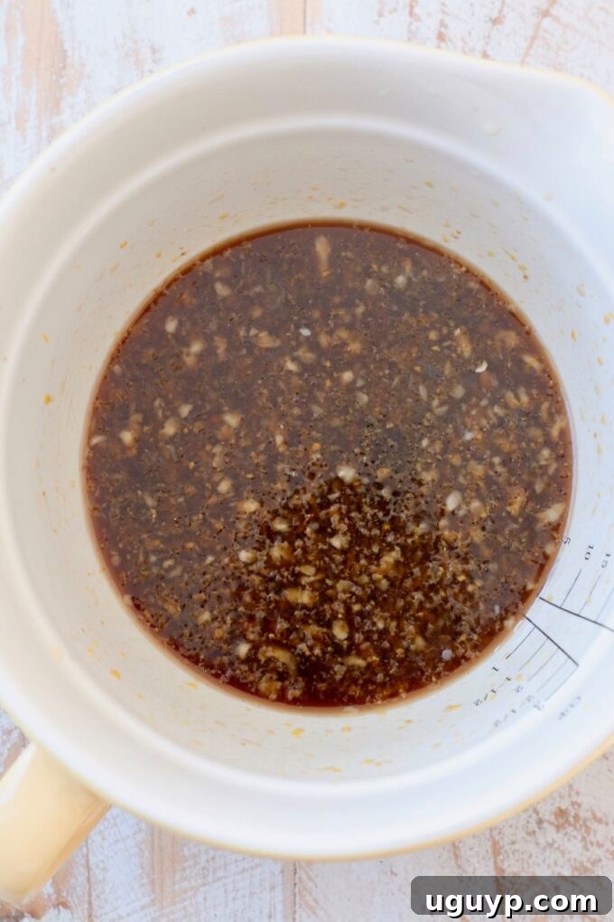 orange sauce in mixing bowl