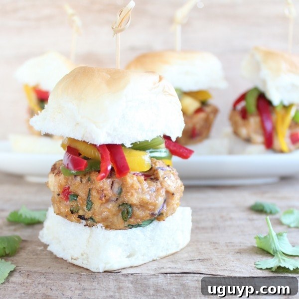 Asian Chicken Sliders with vibrant slaw topping