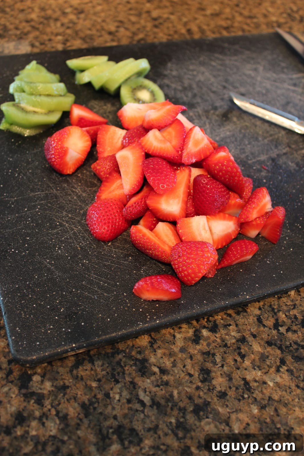 Freshly Sliced Strawberries and Kiwi ready for pureeing