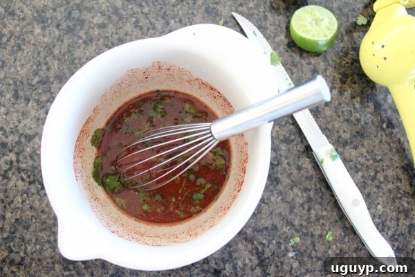 Adding Sauce to Chicken and Veggies
