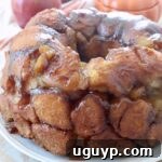 Cooked Pumpkin Apple Monkey Bread presented beautifully on a serving plate.