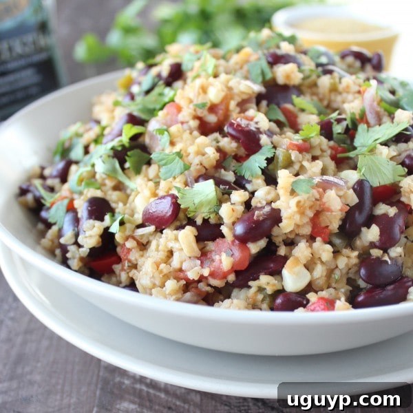 Freekeh grains with Mexican spices, showcasing the core ingredients of the dish.