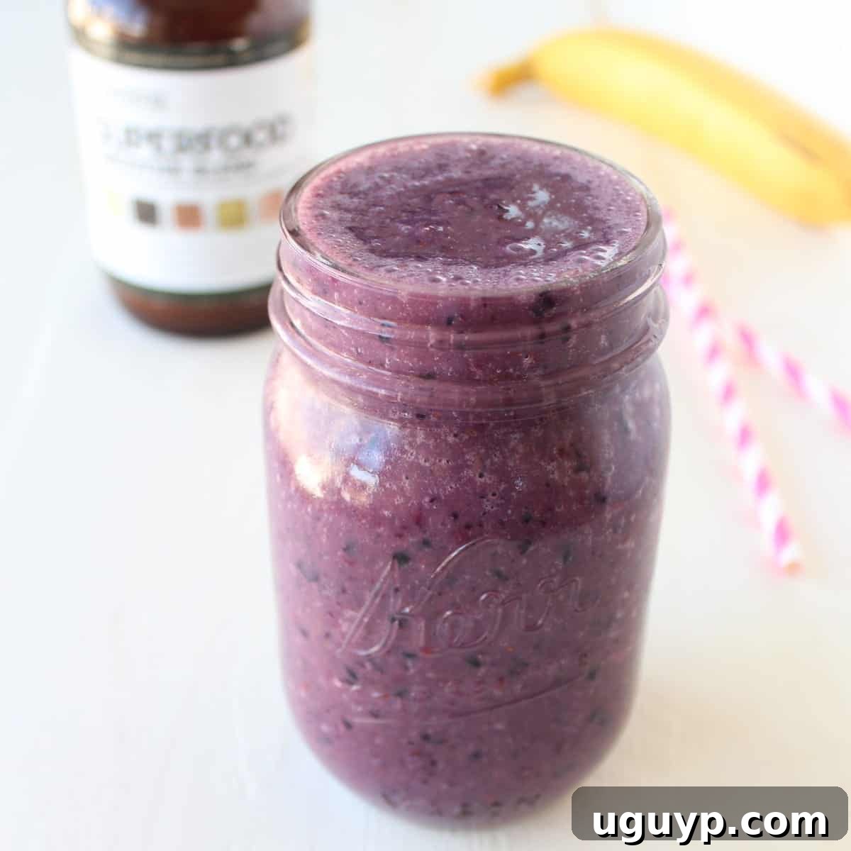 Delicious and vibrant Immunity Boosting Orange Berry Smoothie in a glass