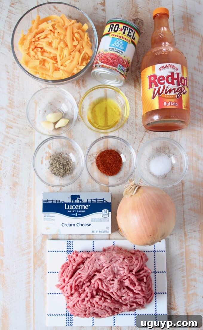 Array of fresh ingredients laid out for Buffalo Cheeseburger Dip preparation