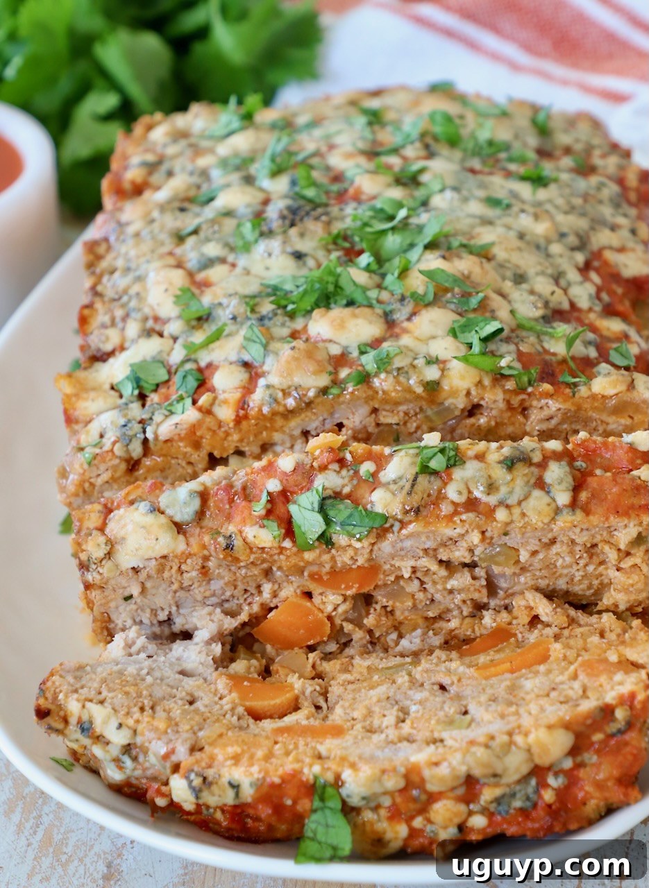 sliced meatloaf on white plate