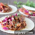 Slow Cooked Korean BBQ Chicken Tacos