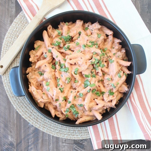 Italian Sausage and Four Cheese Penne Pasta tossed together