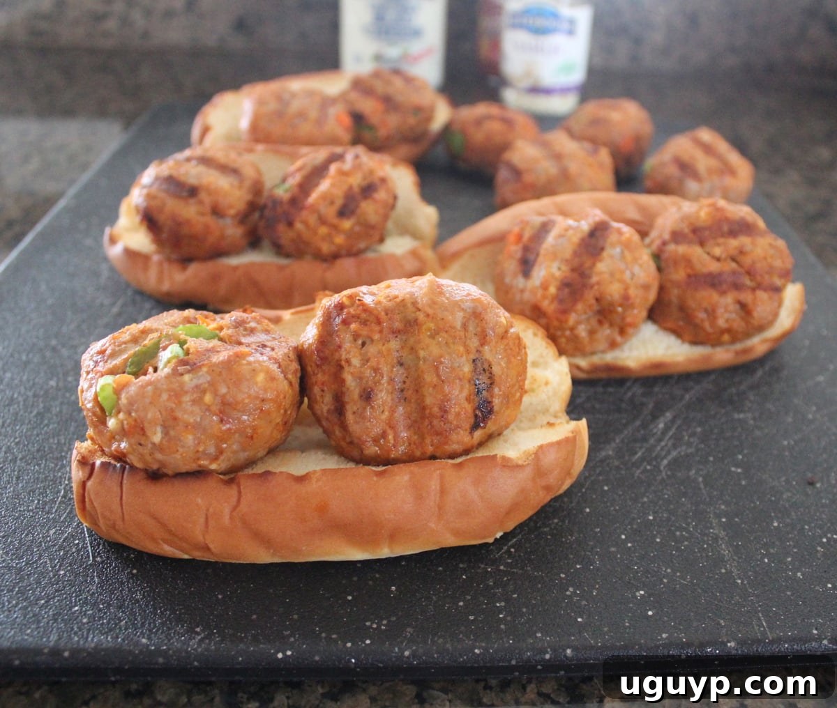 Grilled Buffalo Turkey Meatballs on a hot dog bun