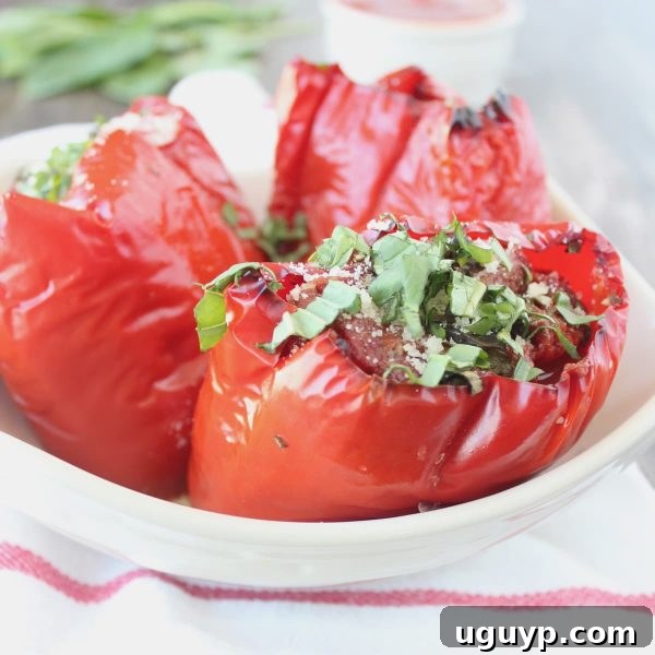 Top-down view of Slow Cooker Italian Stuffed Peppers, highlighting the vibrant colors and ample marinara sauce
