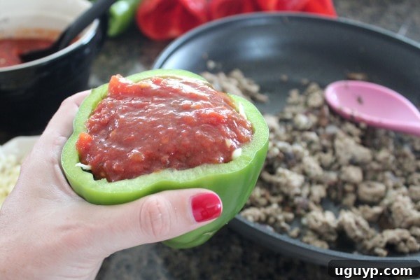 Bell peppers stuffed with turkey and cheese, then topped with marinara sauce