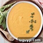 Creamy butternut squash pasta sauce in a bowl, ready to serve.