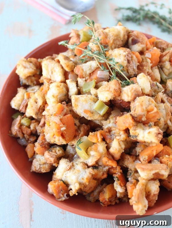 Plated Slow Cooker Sweet Potato Stuffing with fresh herbs