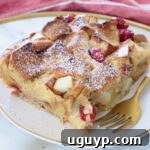 piece of french toast casserole on a plate with a fork