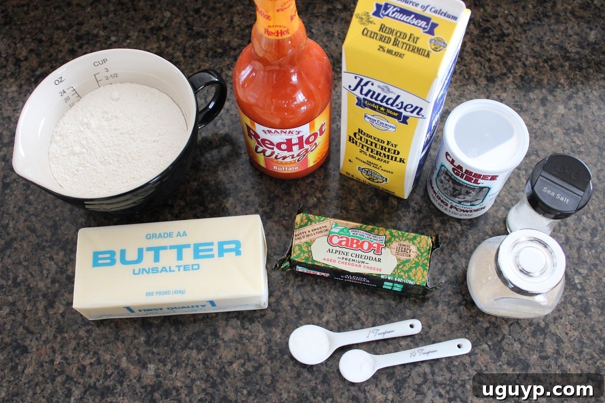 Buffalo Cheddar Biscuit Recipe Ingredients on a granite countertop