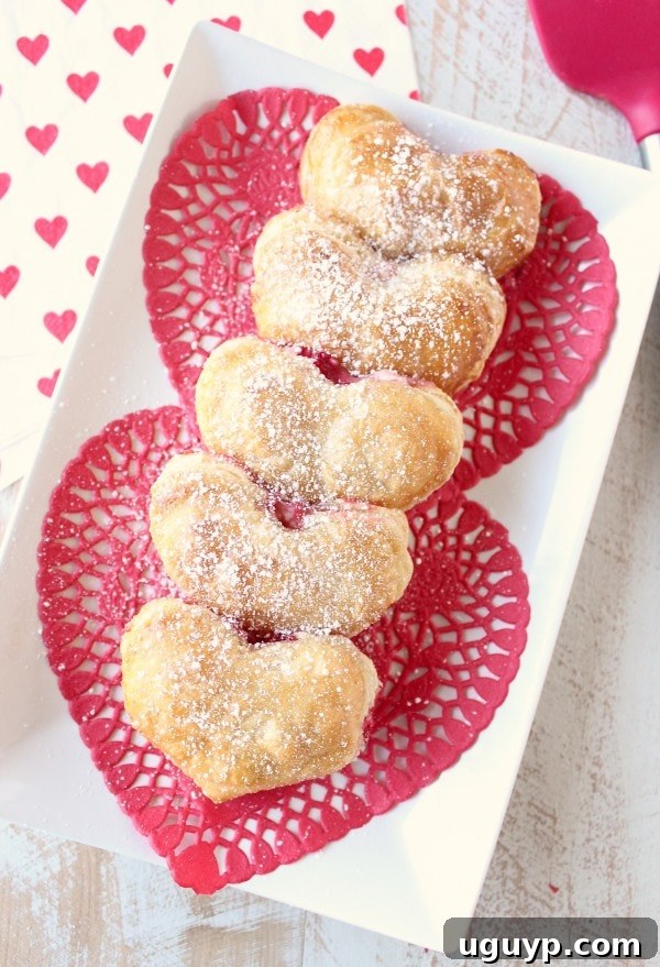 Heart Shaped Strawberry Cheesecake Puff Pastry Pies - Beautifully baked golden pastry