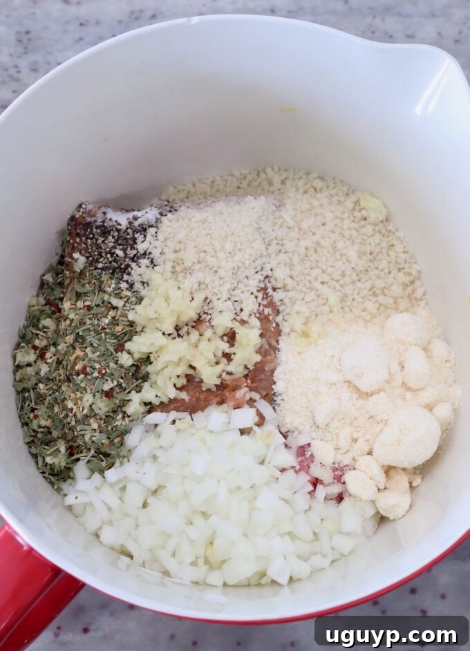 ingredients for Italian meatballs in large mixing bowl