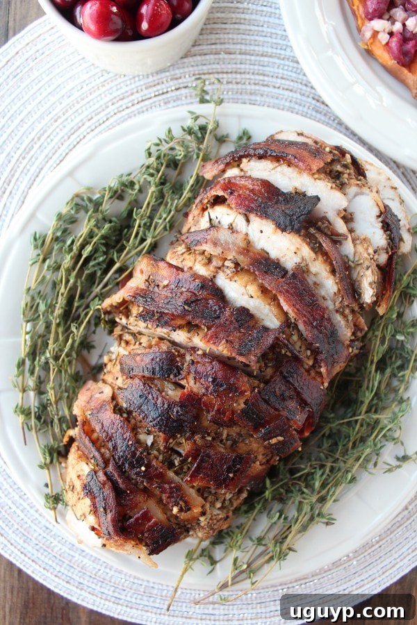 Juicy Garlic Herb Bacon Wrapped Turkey Breast Recipe
