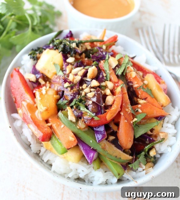 Colorful array of vegetables and pineapple ready for the Thai Peanut Rice Bowl