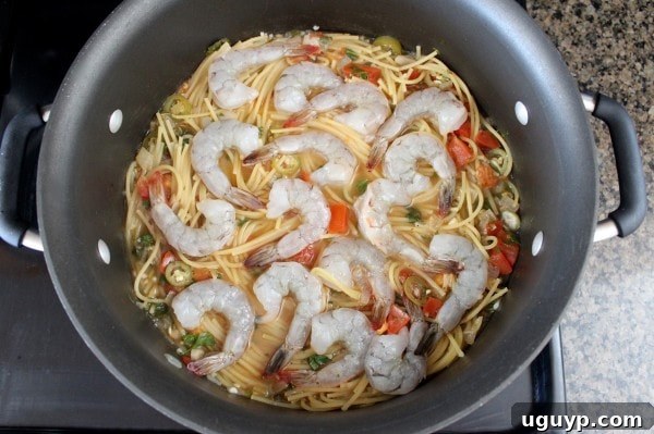 Adding shrimp to the one pot pasta