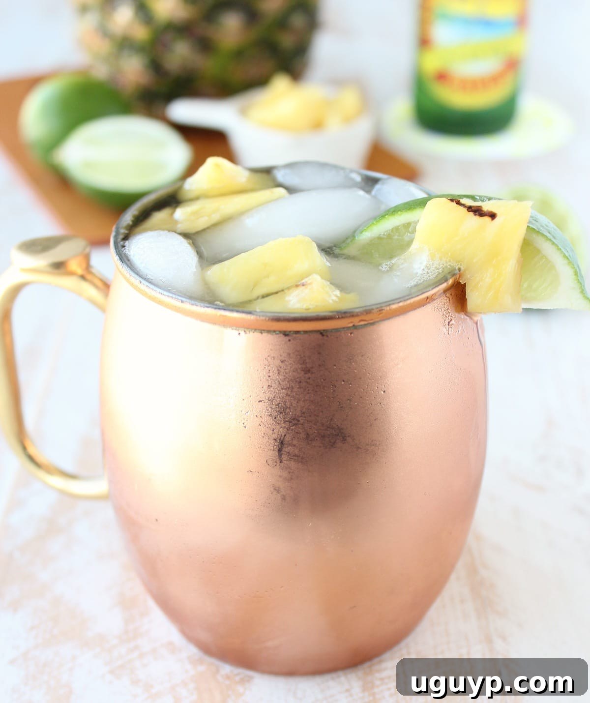 Delicious and Refreshing Grilled Pineapple Moscow Mule with Lime Garnish