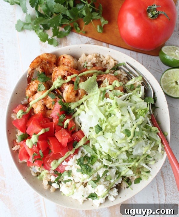 Delicious Chili Lime Shrimp and Mexican Rice Taco Salad served in a large bowl, ready to eat.