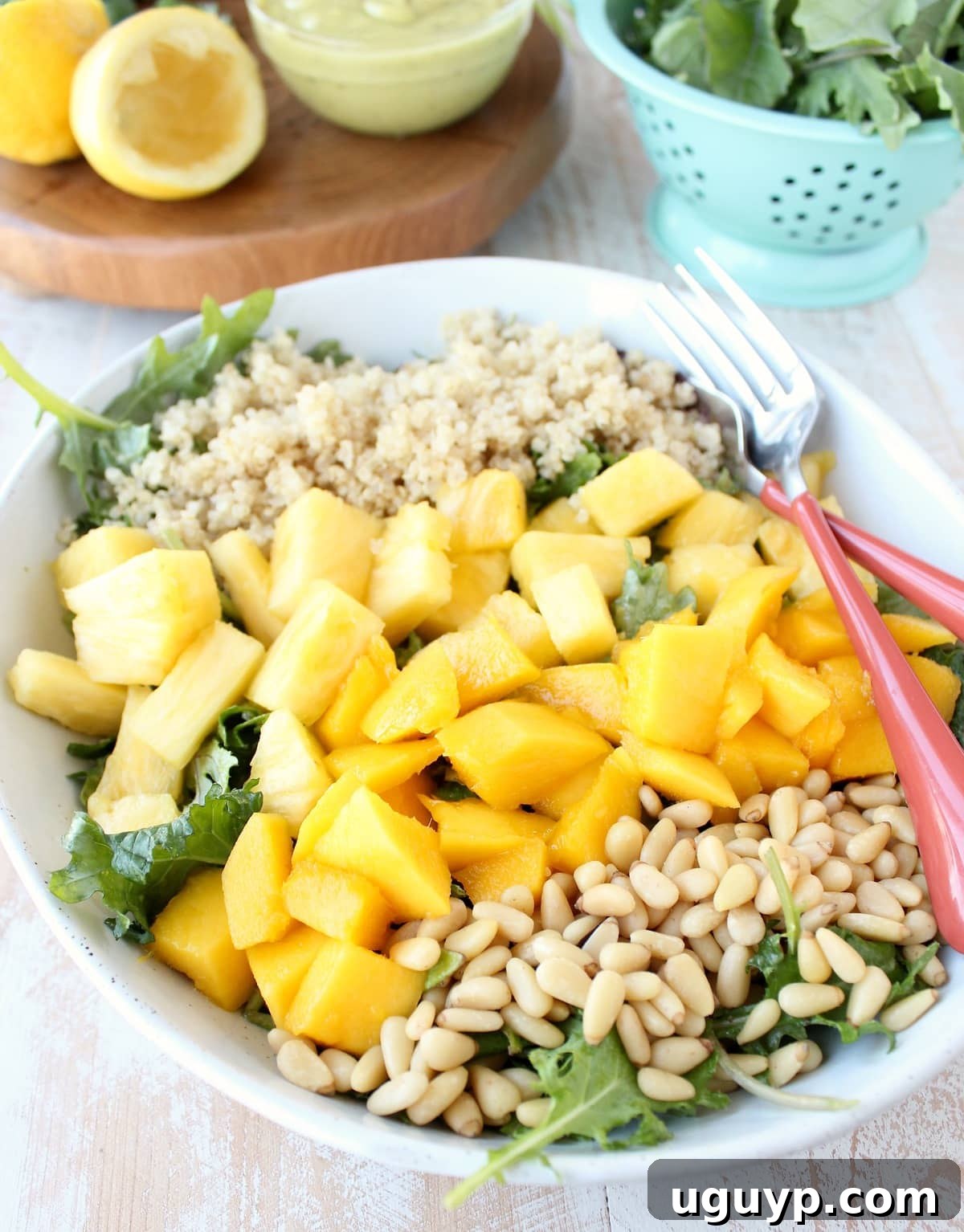 Pineapple Mango Kale Salad served in a bowl