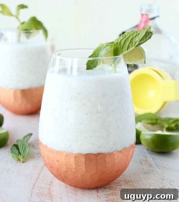 Frozen Coconut Mojito Recipe - Garnish with fresh mint and lime