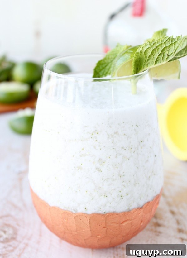 Smooth and creamy Frozen Coconut Mojito in the blender