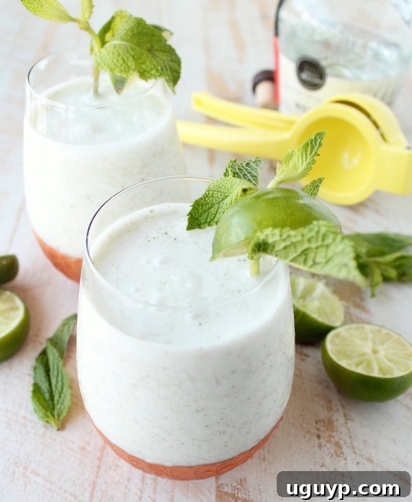 Frozen Coconut Mojito served outdoors on a wooden table