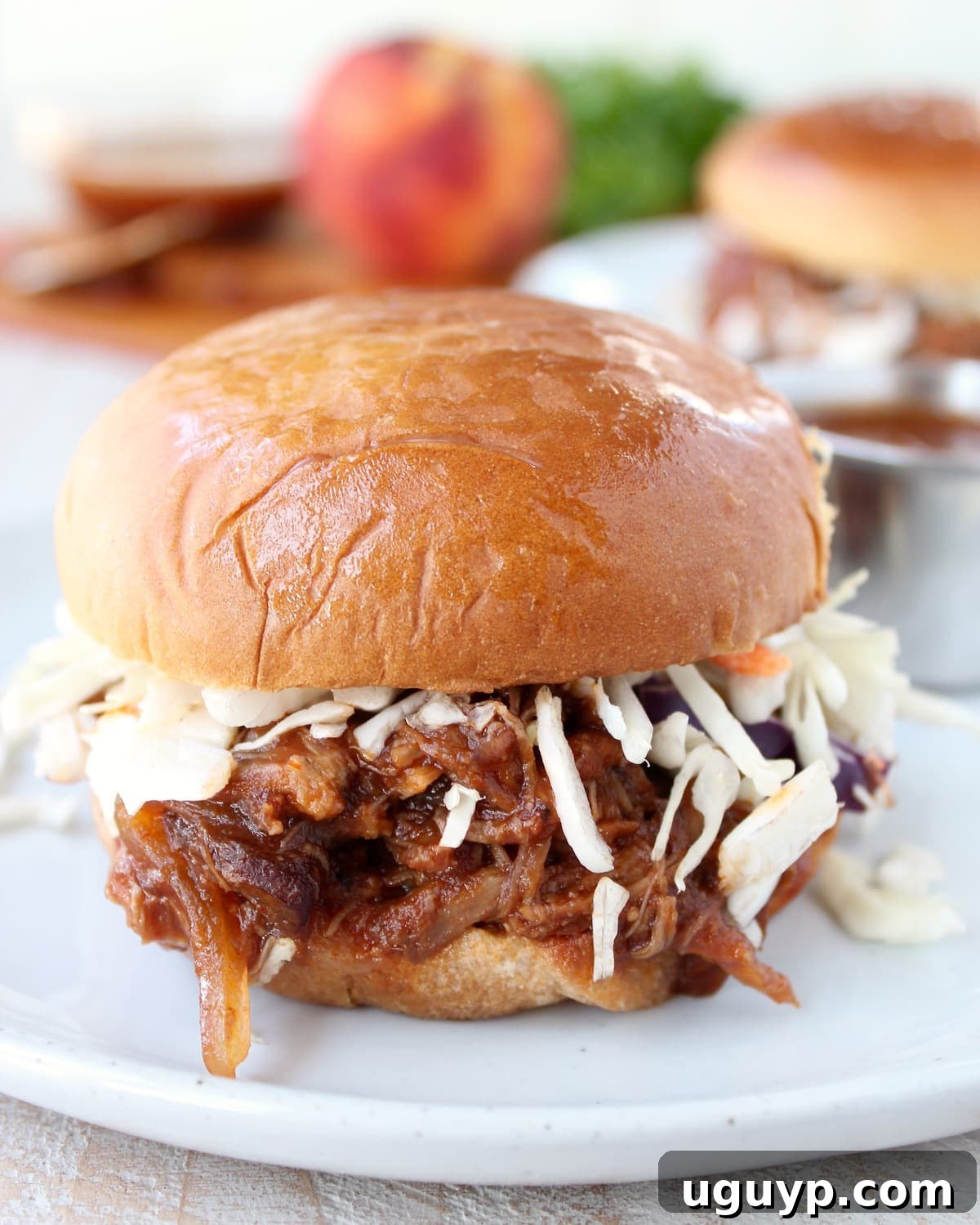 Delicious Slow Cooked Peach BBQ Pulled Pork Sandwich