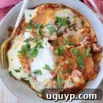 bowl of cooked lasagna with fork