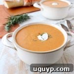 Delicious, vegetarian sweet potato soup recipe with rosemary roasted sweet potatoes, vegetable broth & a hint of cream, ready in 30 minutes!