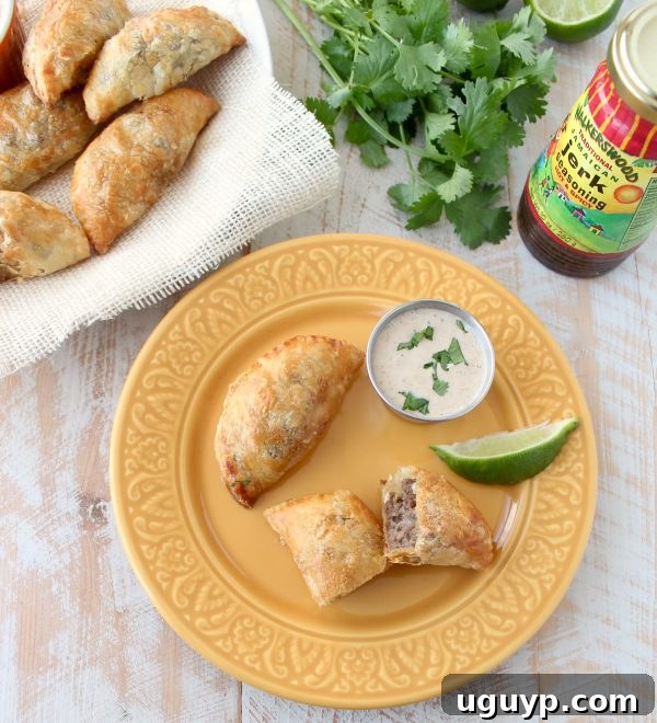 Closeup of freshly baked Jamaican Jerk Beef Patties, showcasing their golden crust and savory filling.