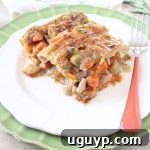 A small image of a slice of turkey pot pie, showcasing its golden crust and hearty filling.
