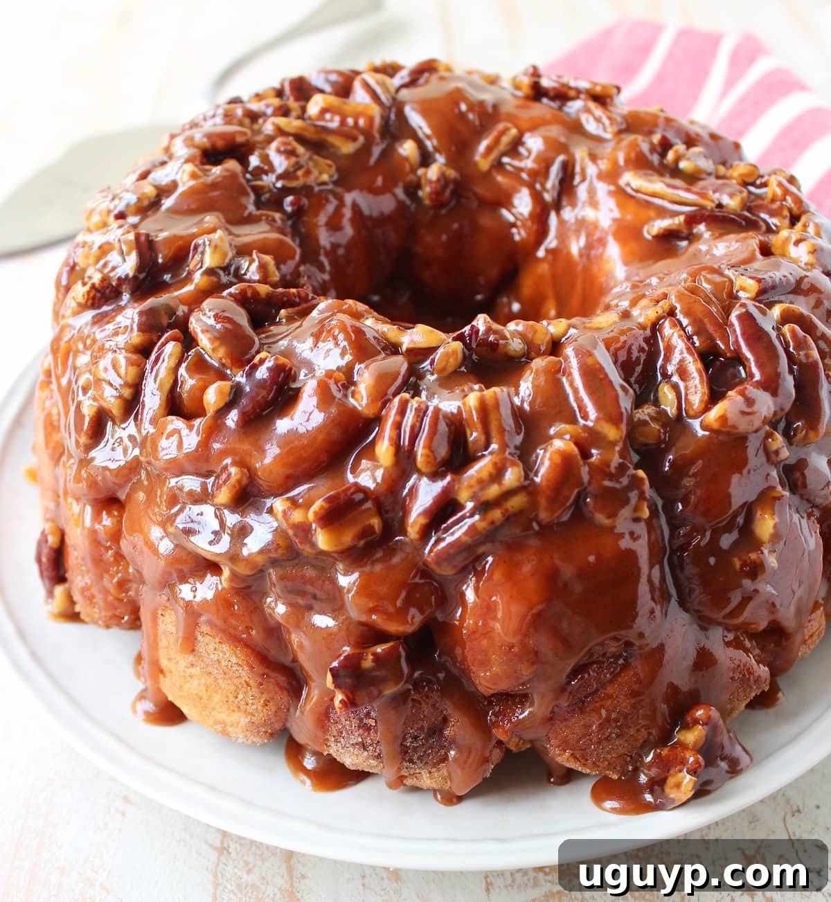 A beautiful top-down shot of the finished Salted Caramel Pecan Monkey Bread on a serving platter.