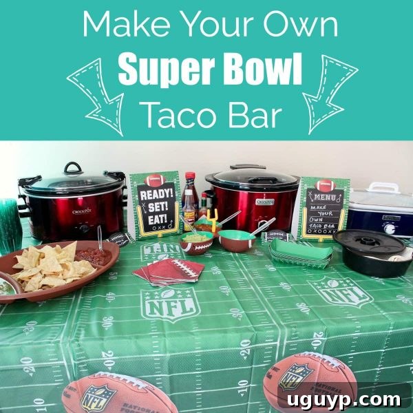 Completed Super Bowl Taco Bar with football-themed decorations and a generous spread of taco fillings and toppings