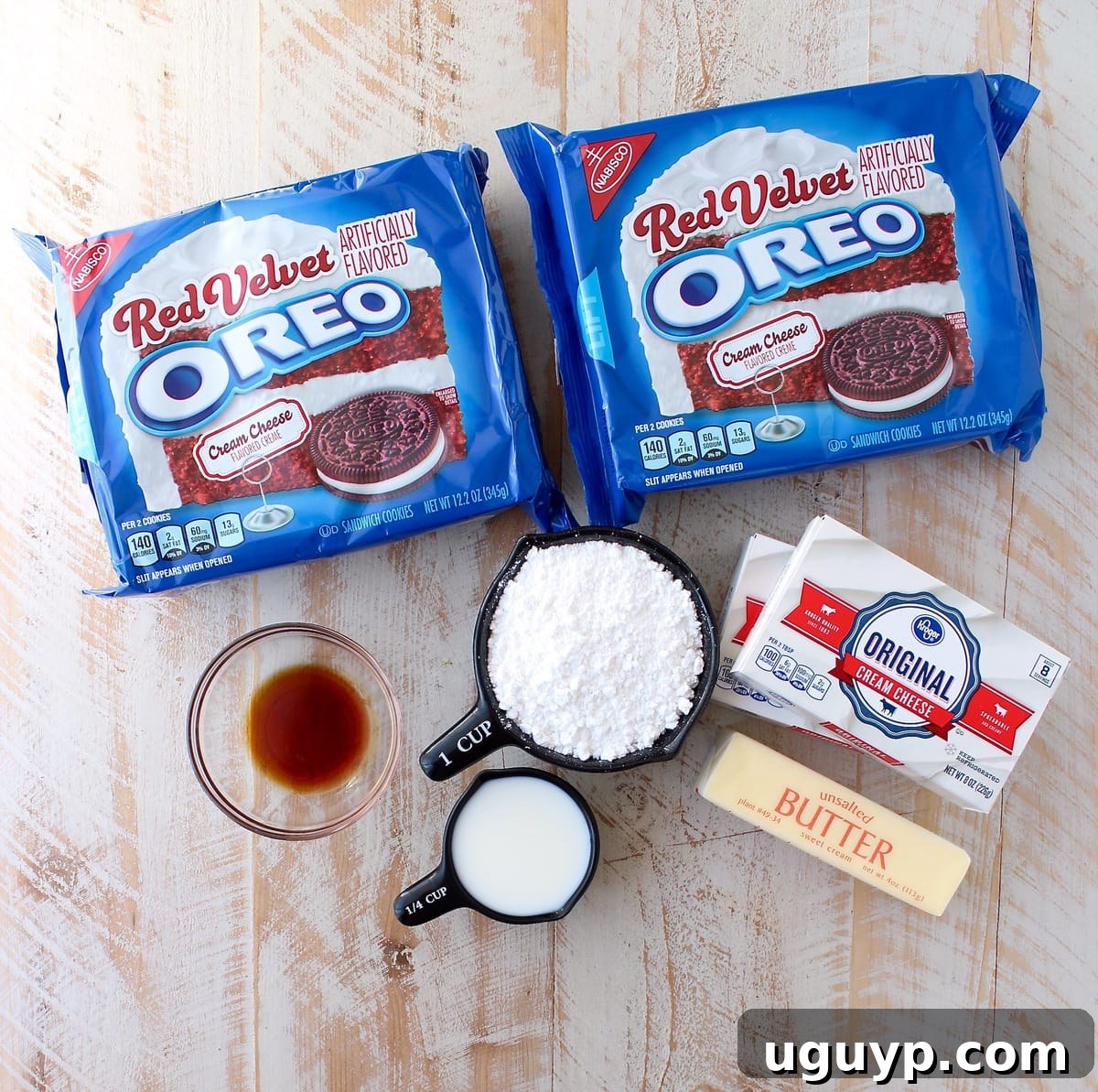 Delicious no-bake Red Velvet Oreo cheesecake bars cut into heart shapes, perfect for a romantic Valentine's Day dessert.