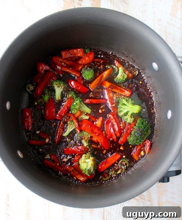 vegetables and teriyaki sauce in a large pot