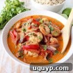 Shrimp & vegetables are cooked into a simple, delicious red curry sauce in this Red Curry Shrimp recipe, made in only 20 minutes for an easy weeknight meal!